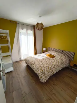 Un ou plusieurs lits dans un hébergement de l'établissement Gîte du Bois