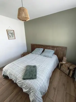 Un ou plusieurs lits dans un hébergement de l'établissement Gîte du Bois