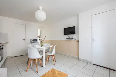 Cuisine ou kitchenette dans l'établissement Le Nid de la Fauvette - Hyper Centre