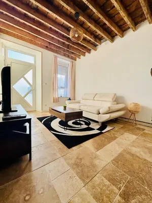 Coin salon dans l'établissement Chaleureuse maison au coeur de l'Avesnois