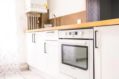Cuisine ou kitchenette dans l'établissement Appartement Cocoon Chalons Centre
