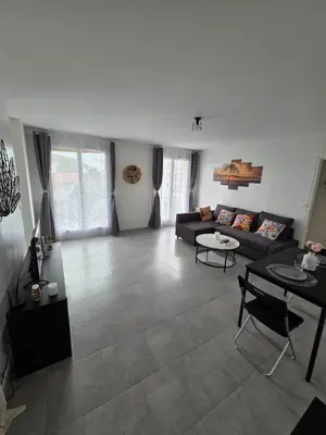 Coin salon dans l'établissement Cosy cocon au cœur de L'Isle - Centre ville