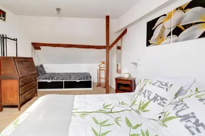 Un ou plusieurs lits dans un hébergement de l'établissement Gîte Ma Campagne - Avec sauna
