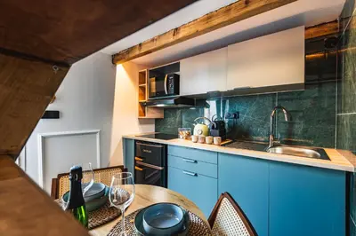Cuisine ou kitchenette dans l'établissement Cocon d Orion