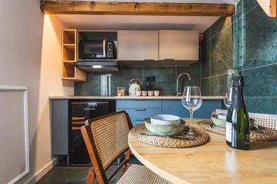 Cuisine ou kitchenette dans l'établissement Cocon d Orion