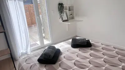 Un ou plusieurs lits dans un hébergement de l'établissement La Maison de Lilou - Gîtes en Champagne