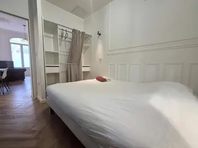 Un ou plusieurs lits dans un hébergement de l'établissement Bogota - Charme central à Reims - 6P