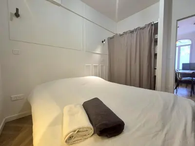 Un ou plusieurs lits dans un hébergement de l'établissement Bogota - Charme central à Reims - 6P