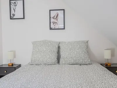 Un ou plusieurs lits dans un hébergement de l'établissement Duplex au coeur de Reims - 2 chambres