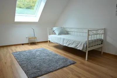 Un ou plusieurs lits dans un hébergement de l'établissement Maison détente & confort près de Disney - 25 min