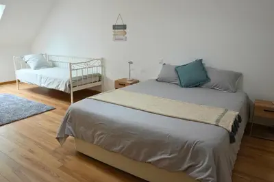 Un ou plusieurs lits dans un hébergement de l'établissement Maison détente & confort près de Disney - 25 min