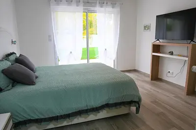 Un ou plusieurs lits dans un hébergement de l'établissement Maison détente & confort près de Disney - 25 min