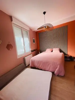 Un ou plusieurs lits dans un hébergement de l'établissement Triplex sensuel