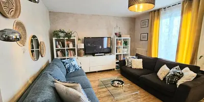 Télévision ou salle de divertissement dans l'établissement Reims Center Cathedral View
