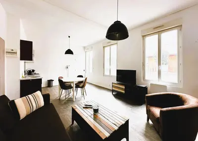 Coin salon dans l'établissement Santiago - 4P - Cosy Appartement