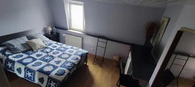 Un ou plusieurs lits dans un hébergement de l'établissement chambre chez particuier