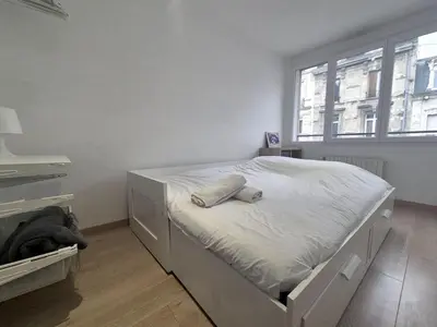 Un ou plusieurs lits dans un hébergement de l'établissement Dubaï - Élégant logement rémois - 10P
