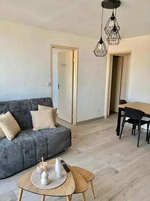 Coin salon dans l'établissement appartement 30m2 spatieux et lumineux
