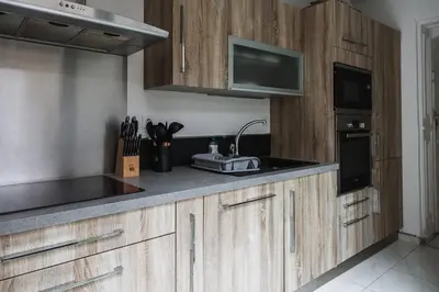 Cuisine ou kitchenette dans l'établissement Evasion Prestige - Suite Spa, Sauna & Patio