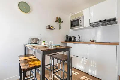 Cuisine ou kitchenette dans l'établissement Charmant appartement - 4 personnes