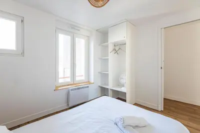 Un ou plusieurs lits dans un hébergement de l'établissement Charmant appartement - 4 personnes