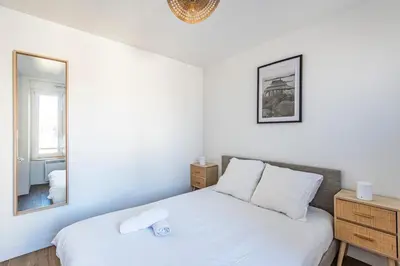 Un ou plusieurs lits dans un hébergement de l'établissement Charmant appartement - 4 personnes