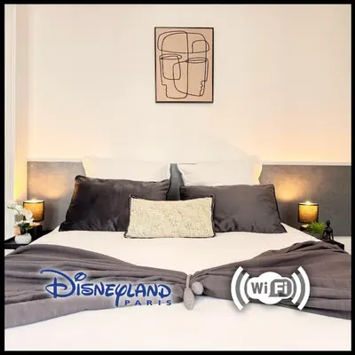Un ou plusieurs lits dans un hébergement de l'établissement Studio Sena - Disney - Meaux City Center - Paris