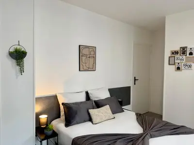 Un ou plusieurs lits dans un hébergement de l'établissement Studio Sena - Disney - Meaux City Center - Paris
