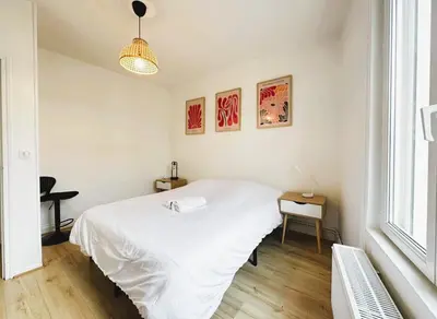 Un ou plusieurs lits dans un hébergement de l'établissement Las Vegas - Cosy appartement - 4P