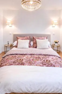 Un ou plusieurs lits dans un hébergement de l'établissement Appartement Cosy Centre Ville De Reims
