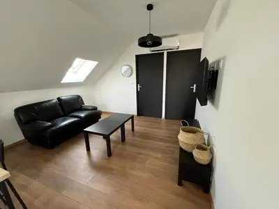 Télévision ou salle de divertissement dans l'établissement Studio Centre Bourg Arrivée et Départ Autonome