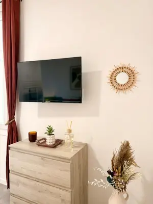 Télévision ou salle de divertissement dans l'établissement Studio Rosa - Disney - Meaux City Center - Paris