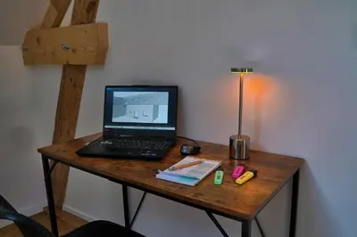 Télévision ou salle de divertissement dans l'établissement Les clés du matz