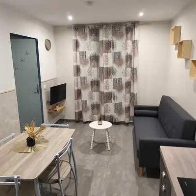 Appartement RDC avec parking au centre-ville