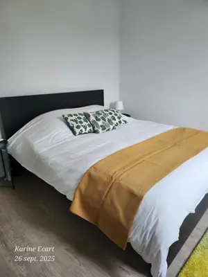 Un ou plusieurs lits dans un hébergement de l'établissement Maison Cosy, proche Reims, La Nichée