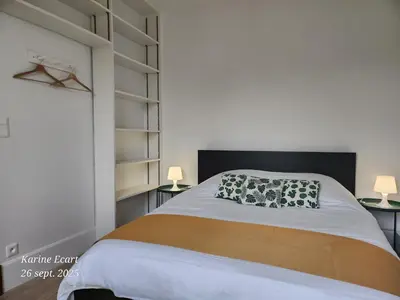 Un ou plusieurs lits dans un hébergement de l'établissement Maison Cosy, proche Reims, La Nichée
