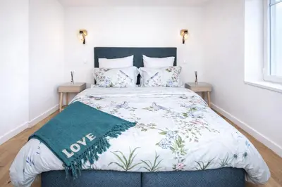 Un ou plusieurs lits dans un hébergement de l'établissement Appartement Prestige Cœur de Reims
