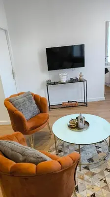 Télévision ou salle de divertissement dans l'établissement Appartement Prestige Cœur de Reims