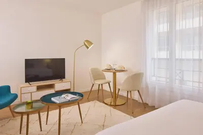 Télévision ou salle de divertissement dans l'établissement Quality Aparthotel Meaux