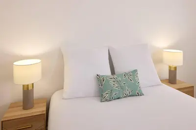 Un ou plusieurs lits dans un hébergement de l'établissement Quality Aparthotel Meaux
