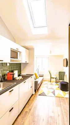Cuisine ou kitchenette dans l'établissement L'arc en Ciel - Appartement paisible à proximité de la Cathédrale