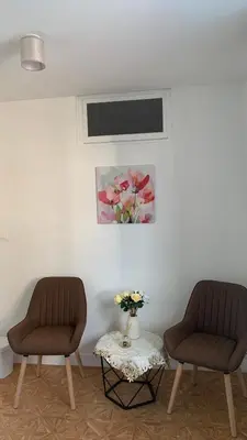 Coin salon dans l'établissement Elegant and cozy city center B&B