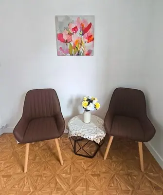 Coin salon dans l'établissement Elegant and cozy city center B&B