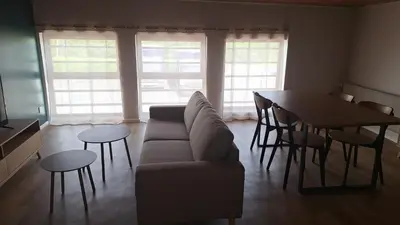 Coin salon dans l'établissement Appartement spacieux tout équipé au coeur de l'avesnois