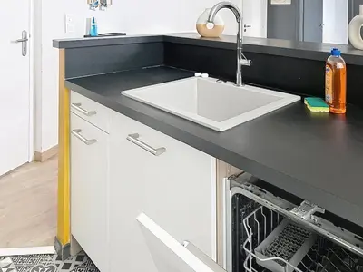 Cuisine ou kitchenette dans l'établissement Le Parisien - Calme et central