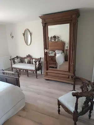 Un ou plusieurs lits dans un hébergement de l'établissement Gîte cottage Domaine La Boilière