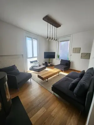 Coin salon dans l'établissement Town center Kéroussel house - 6 people - 2 Bedrooms - Swimming pool