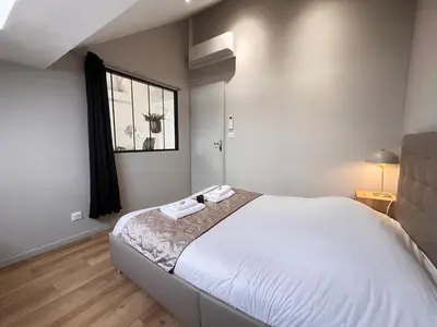 Un ou plusieurs lits dans un hébergement de l'établissement E - Le loft in Epernay T2 au cœur du centre ville
