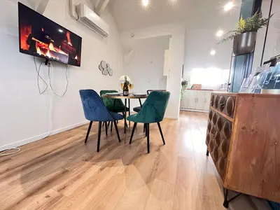 Télévision ou salle de divertissement dans l'établissement E - Le loft in Epernay T2 au cœur du centre ville