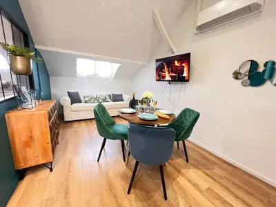 Télévision ou salle de divertissement dans l'établissement E - Le loft in Epernay T2 au cœur du centre ville